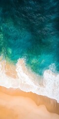 Aerial View of Ocean Waves Crashing on Sandy Beach