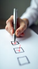 person signing a checkmark boxes