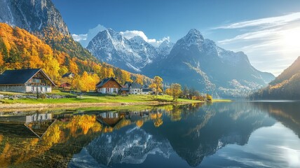 Fototapeta premium Scenic mountain landscape with vibrant autumn colors reflecting in a tranquil lake, showcasing nature's beauty and serenity.