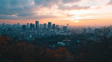 Fototapeta premium Stunning cityscape at sunset with towering buildings and a vibrant skyline, surrounded by lush greenery.