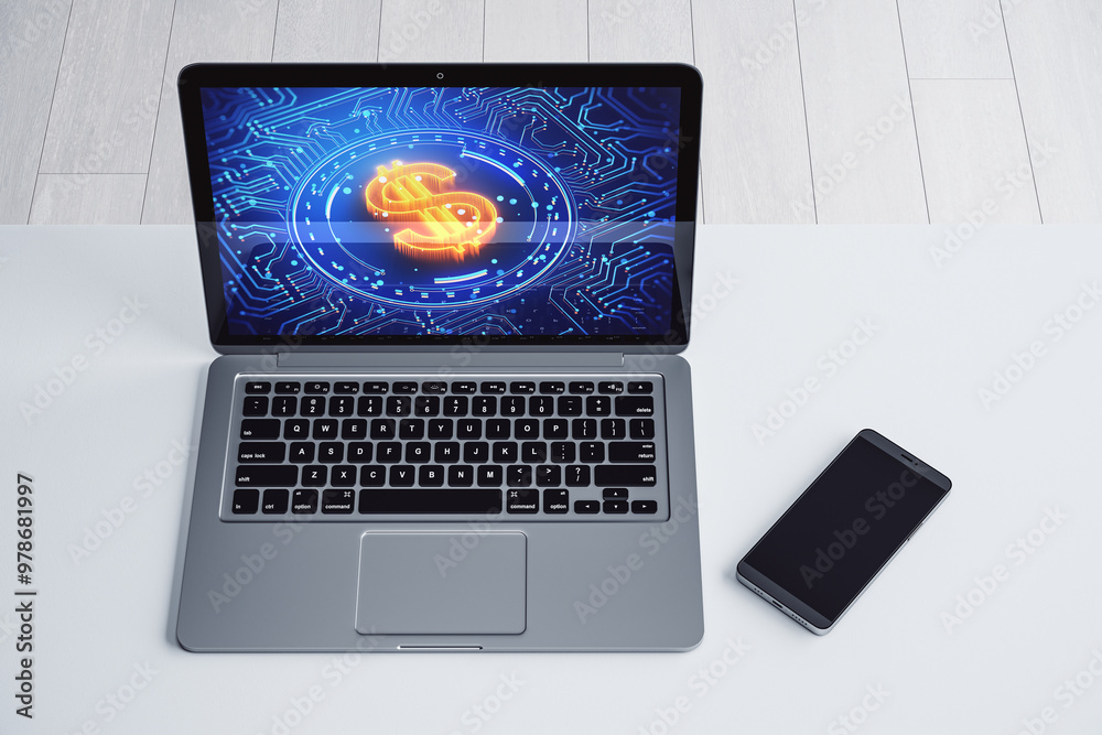 Poster close up of laptop with blue dollar icon screen on white desk with mobile phone. workplace concept. 