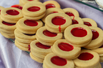Close-up of traditional handmade pastries with a hint of cherry inside