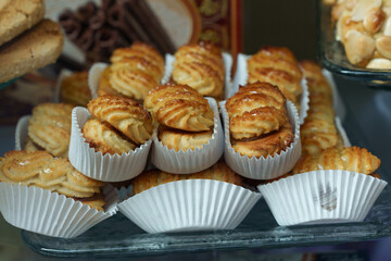 traditional sweets in the shop window of an old-fashioned cake shop