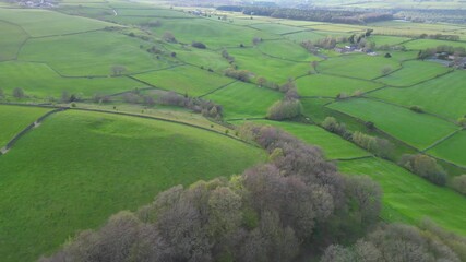 High Angle View of British Agricultural Farms at Countryside and Beautiful Landscape of Near Hills of Rotherham, England Great Britain of UK. April 30th, 2024