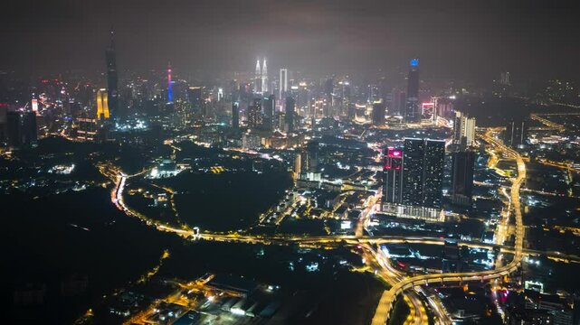 4k aerial time lapse of night scene at Kuala Lumpur city center. 