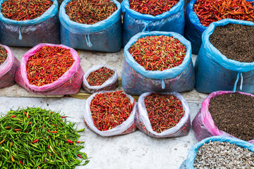 Top View Pile of Fresh Chili for Sale in the Vegetables Market, Vegetable background. Closeup dried chili.