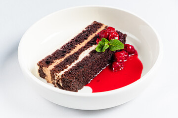 Christmas cake with chocolate and cherries