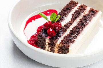 Christmas cake with chocolate and cherries
