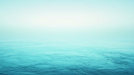 Fototapeta premium A serene ocean view with gentle waves and soft blue tones. Perfect for calm and tranquil themes in photography.