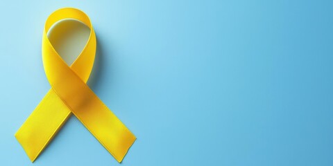 A vibrant yellow ribbon set against a soft blue background, symbolizing hope and awareness. Perfect for campaigns and causes.