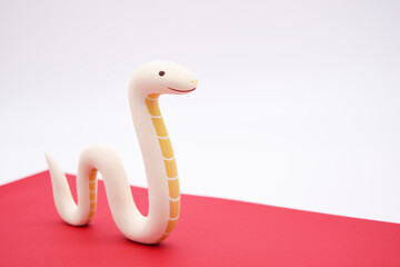 Obraz premium 蛇の立体人形 巳年 年賀素材 