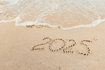 Christmas inscription 2005 on the beach