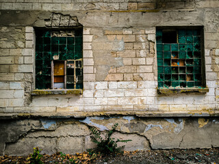 old windows in a brick wall