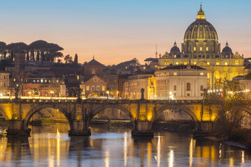Vatican palace and Tiber river at sunset. Rome, Italy