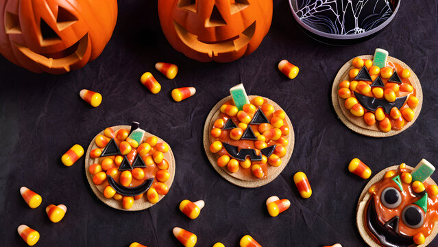 Halloween snacks concept background, Halloween day desserts, sweet dessert on Halloween, various unique snacks on Halloween, cute and unique desserts on Halloween day, ai generated