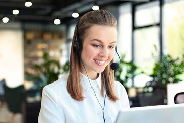 Customer support operator working in a call center office