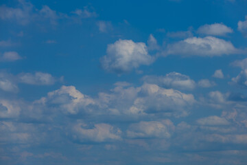 Blue sky and white and gray clouds. Texture background for design.
