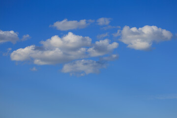 Blue sky and white and gray clouds. Texture background for design.