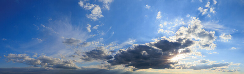 Blue sky and white and gray clouds. Texture background for design.