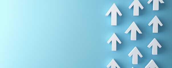 Fototapeta premium A collection of white arrows pointing upward against a blue background, symbolizing growth, progress, and direction.