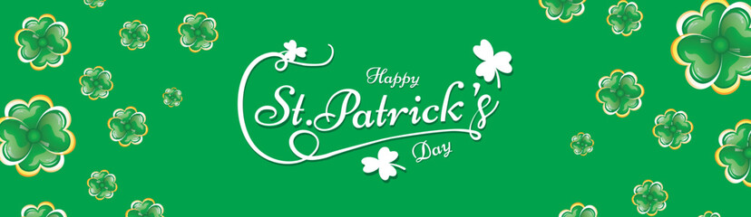 Calligraphy of St Patrick's Day on green background decorated with clover leaves. Header or banner design.