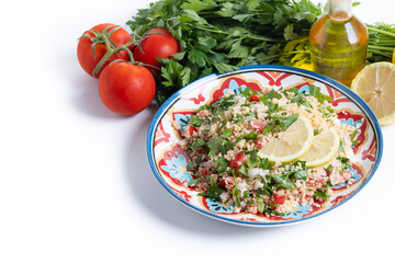 Tabbouleh salad with couscous isolated on white background. Copy space