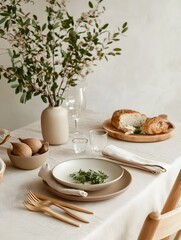 Minimalist Thanksgiving Table Setting with Floral Centerpiece and Shared Meal