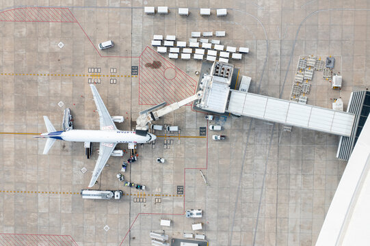 Canelones, Uruguay - 08 June 2023: Aerial view of Aeropuerto de Carrasco with airplanes on the runway and terminal, Canelones, Uruguay.