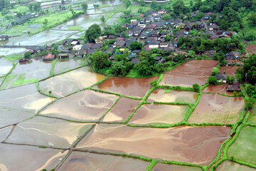 Aerial view of An aerial view of entire village and farming land immersed in water flood rocked in Raigad, Maharashtra, India On July 26th 2005