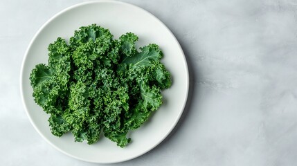 Fototapeta premium Green kale on a white plate, enhanced by soft light, evokes freshness for healthy dining.