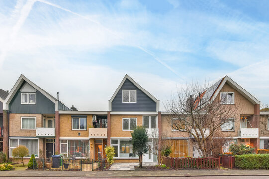 Quiet suburban street with modern houses