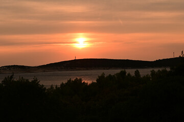 sunset over the island