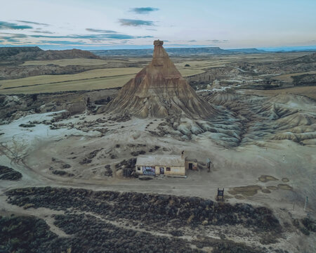 Aerial view of majestic rock formations and vast desert landscape, Bardenas Reales, Navarre, Spain.