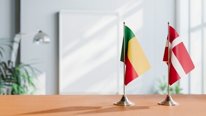 FLAGS OF BENIN AND DENMARK ON TABLE