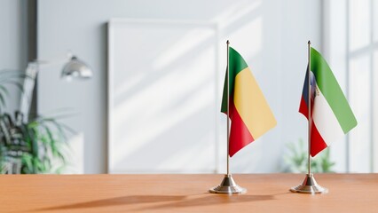 FLAGS OF BENIN AND EQUATORIAL GUINEA ON TABLE