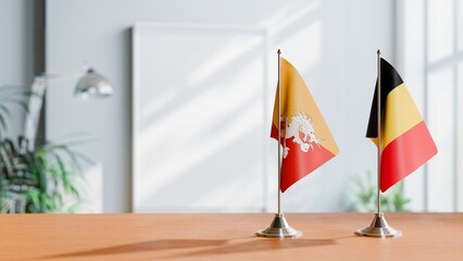 FLAGS OF BHUTAN AND CHAD ON TABLE
