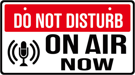 Door sign  in red and white color that says : do not disturb on air now