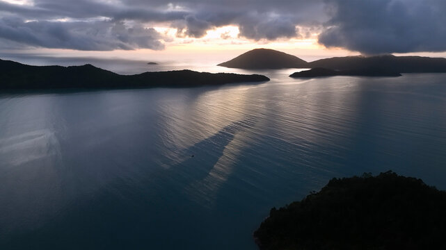 Aerial view of a beautiful tropical bay at sunset with islands and calm waters, Angra dos Reis, Brazil.