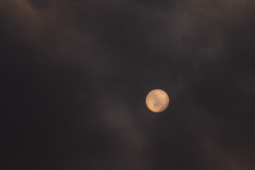 Sunspots on the surface of the sun visible to the naked eye. Astronomical phenomenon captured due to the clouds that filtered the intensity of the sunlight