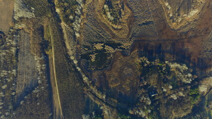 Aerial Autumn Landscape with Forest Textures and a Hidden Pond