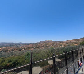 Obraz premium Los Angeles, California, USA, August, 2024: The Griffith Observatory is an observatory in Los Angeles, California on the south-facing slope of Mount Hollywood in Griffith Park.