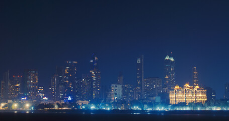 Mumbai, India. Evening City Skyline From Marine Drive , , . Back Bay Coast Of Mumbai City. Skyscrapers And Saifee Hospital In Night Illuminations