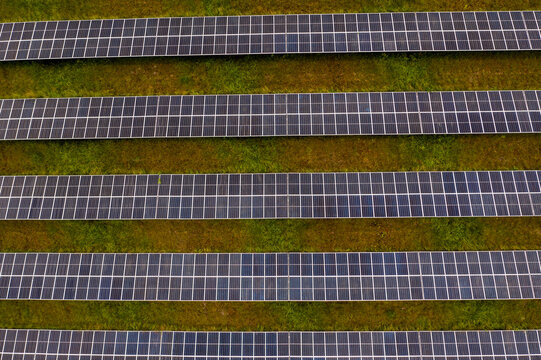 Aerial view of the FP&L Palm Bay Solar Energy Center with modern solar panels in a sustainable solar park, Palm Bay, Florida.