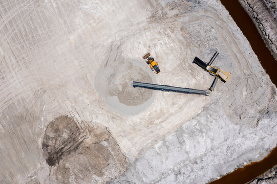 Aerial view of the construction site with excavators and equipment at Stavola Aggregate Supply, Fellsmere, Florida.