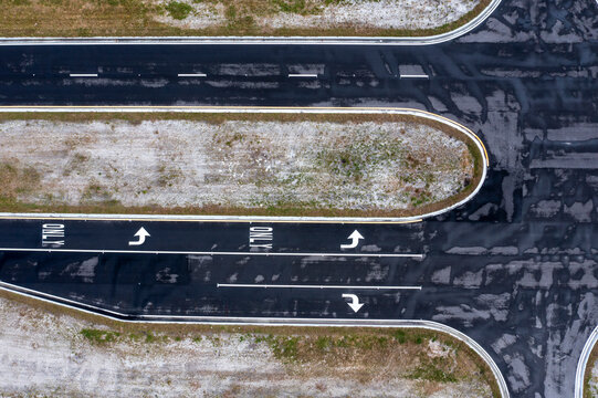 Aerial view of roads inside Cypress Bay West subdivision construction site, Palm Bay, Florida.