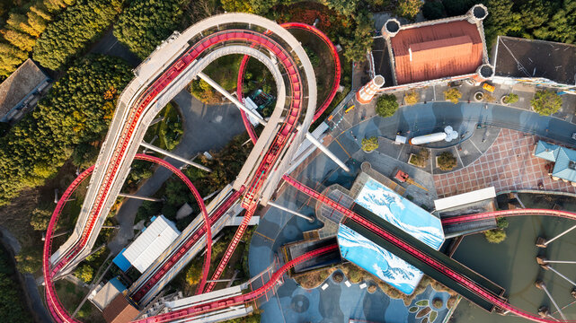 Aerial view of colorful roller coaster and amusement park at Songjiang Sheshan Hill, Songjiang District, People's Republic of China.