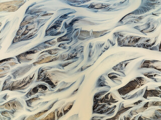 Aerial view of the beautiful Sandvatn river with scenic patterns, Selfoss, Iceland.