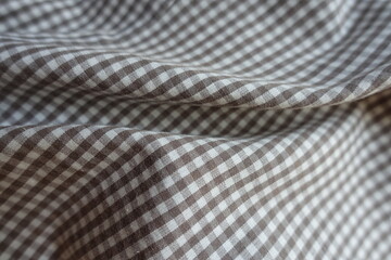 Folded cotton fabric with grey and white gingham pattern