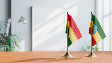 FLAGS OF BOLIVIA AND ETHIOPIA ON TABLE