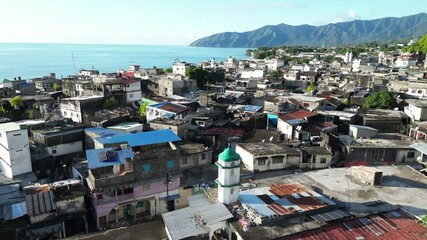 Minaret prayer tower in Anjouan island located in the Indian Ocean, part of the Comoros archipelago Africa Indian Ocean aerial drone footage